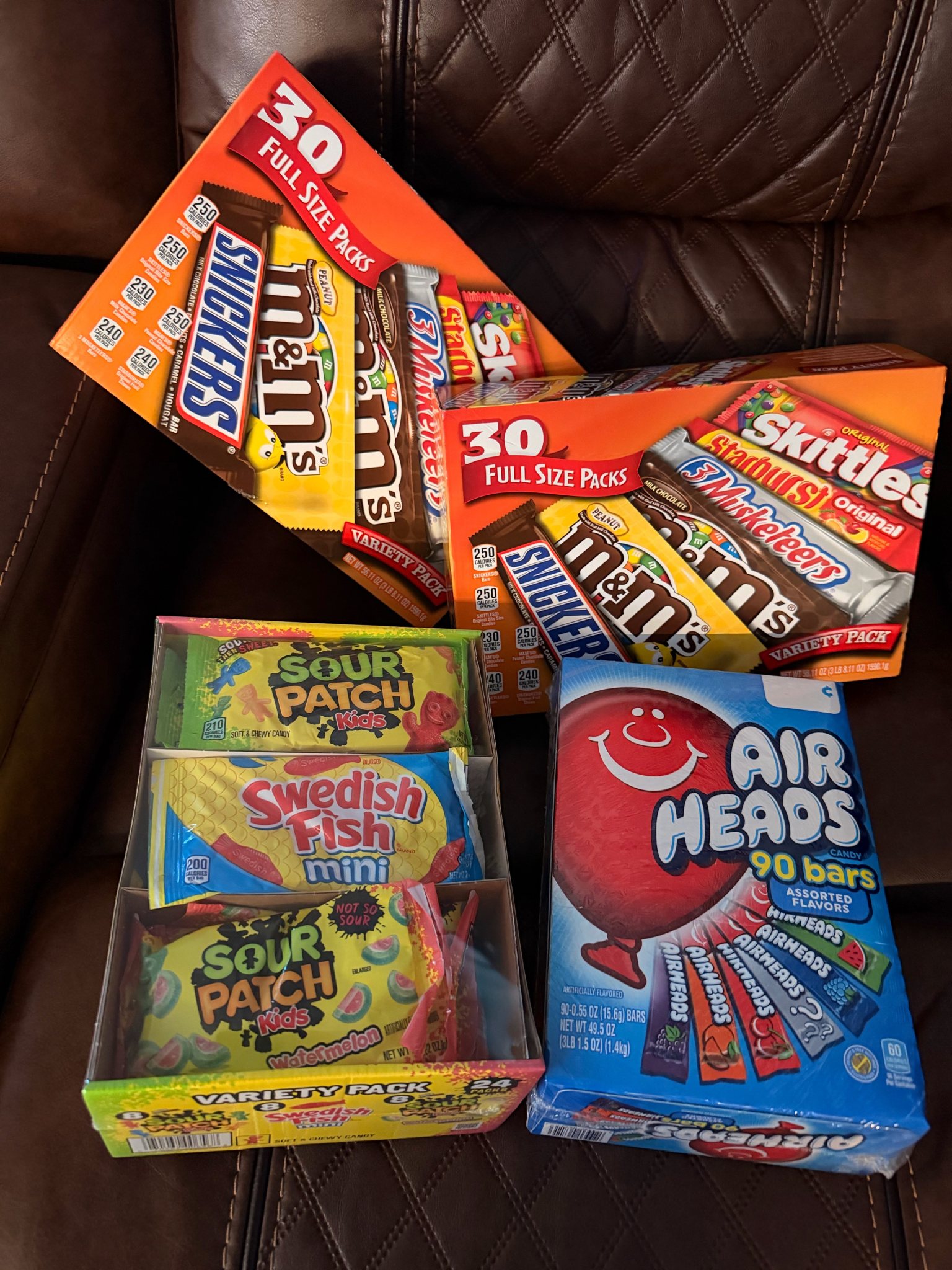 Nate's stash of full-size candy bars for Halloween